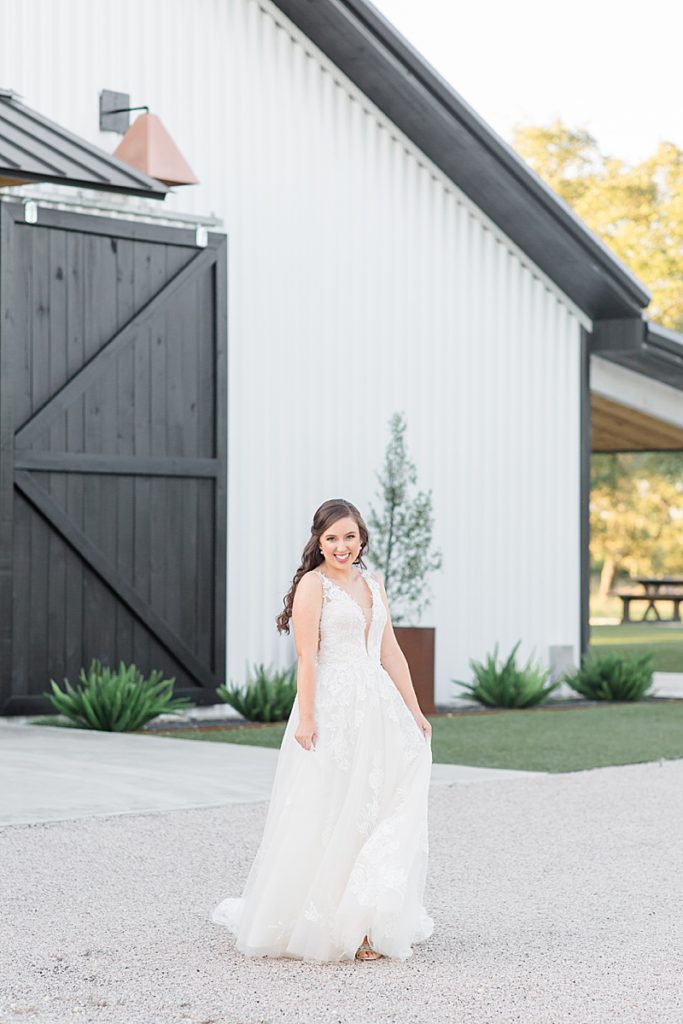 Courtney Bosworth Photography photographs bride twirling her wedding gown