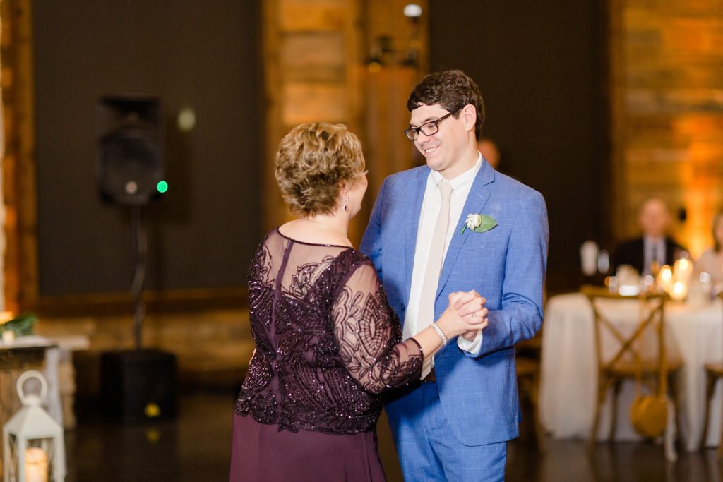 groom and mom dance during dance at Stone Crest Venue wedding reception