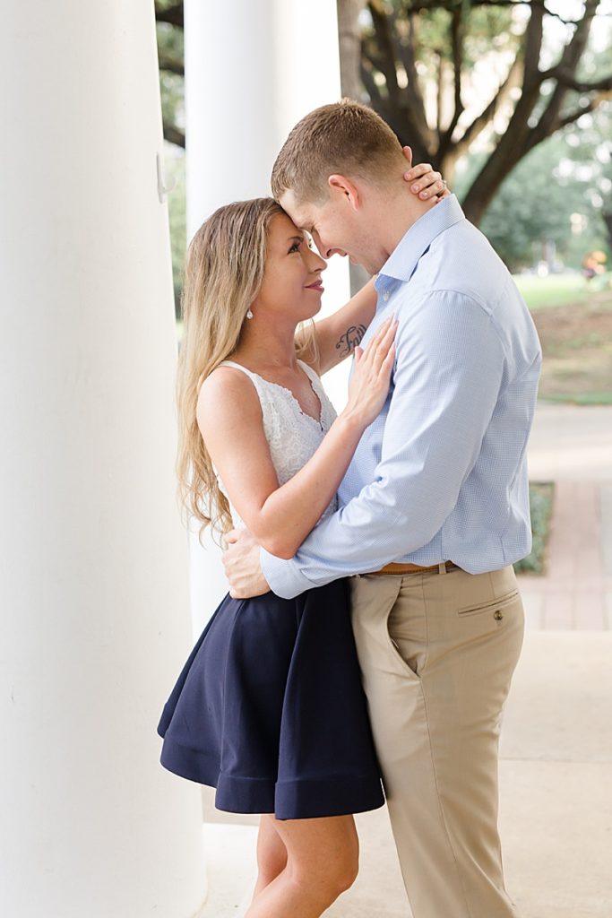 bride and groom touch foreheads during TX engagement photos