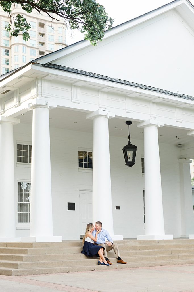 Dallas Texas couple sits on steps during engagement photos