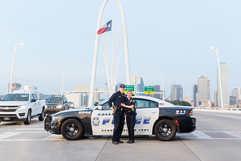 two Dallas police officers celebrate engagement on Margaret Hunt Hill Bridge