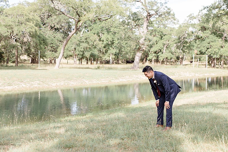 groom gets emotional during first look before Austin Texas wedding