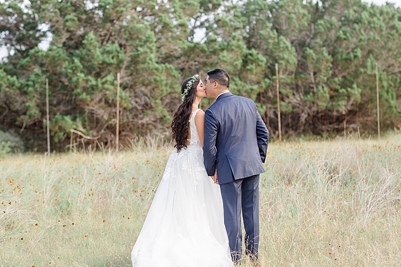 bride and groom kiss in Austin TX