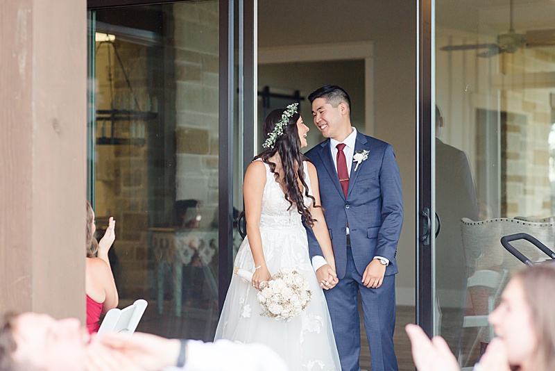 bride and groom enter during Austin Texas wedding reception