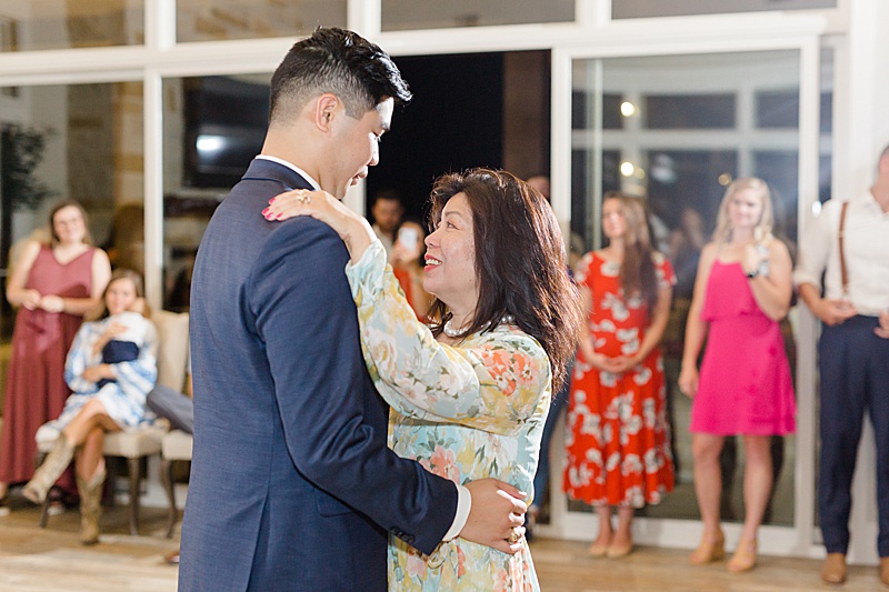 groom dances with mom at Austin Texas wedding reception