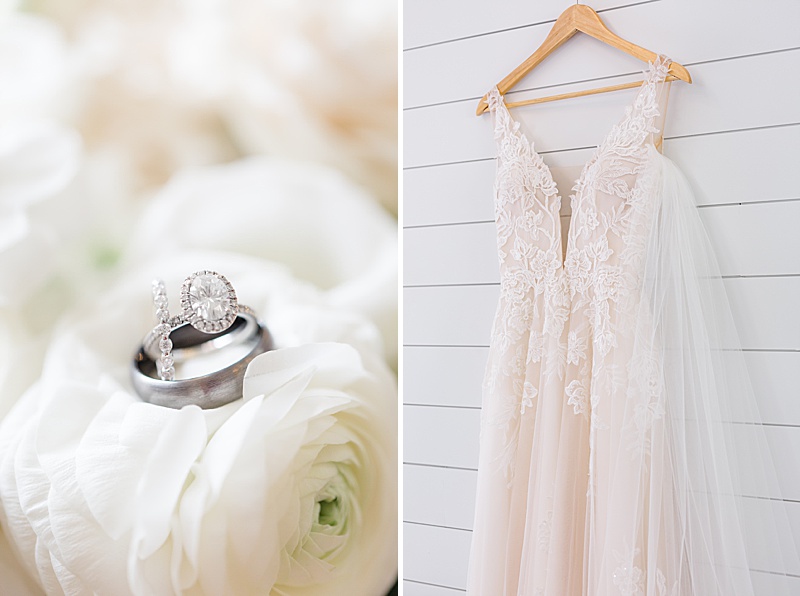 wedding dress and wedding rings rest on white flowers