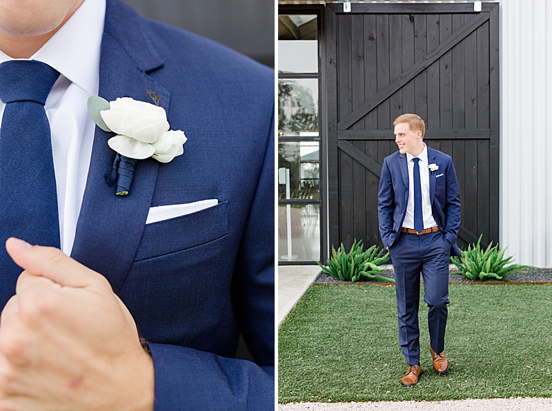 groom in blue suit with white flower prepares for TX wedding