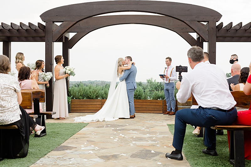 first kiss as husband and wife at Stone Crest Venue