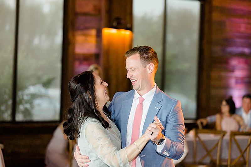groom and mom dance during TX wedding reception