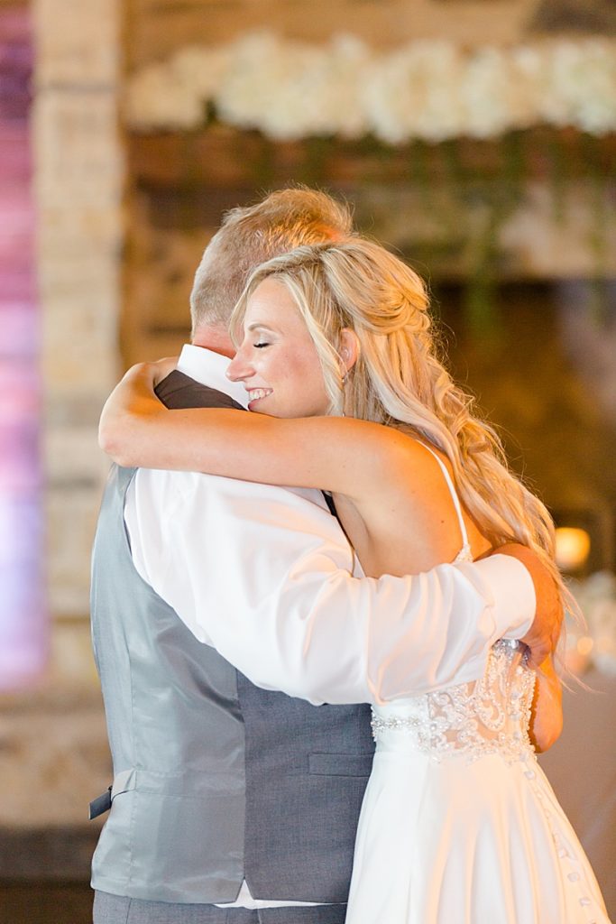  bride hugs dad during dance at Stone Crest Venue