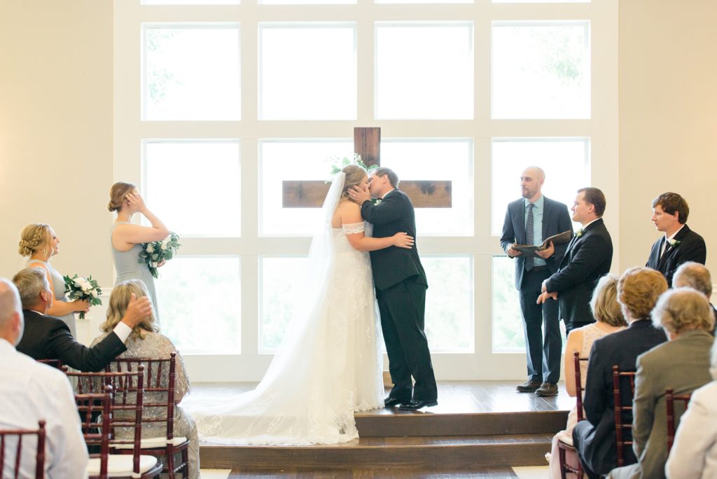 first kiss as husband and wife at The Milestone Denton