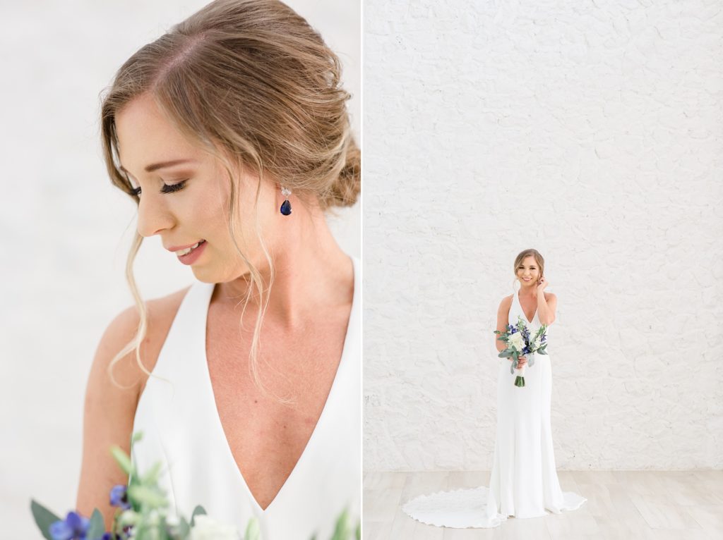bride looks over shoulder in classic gown during Nest at Ruth Farms bridal portraits