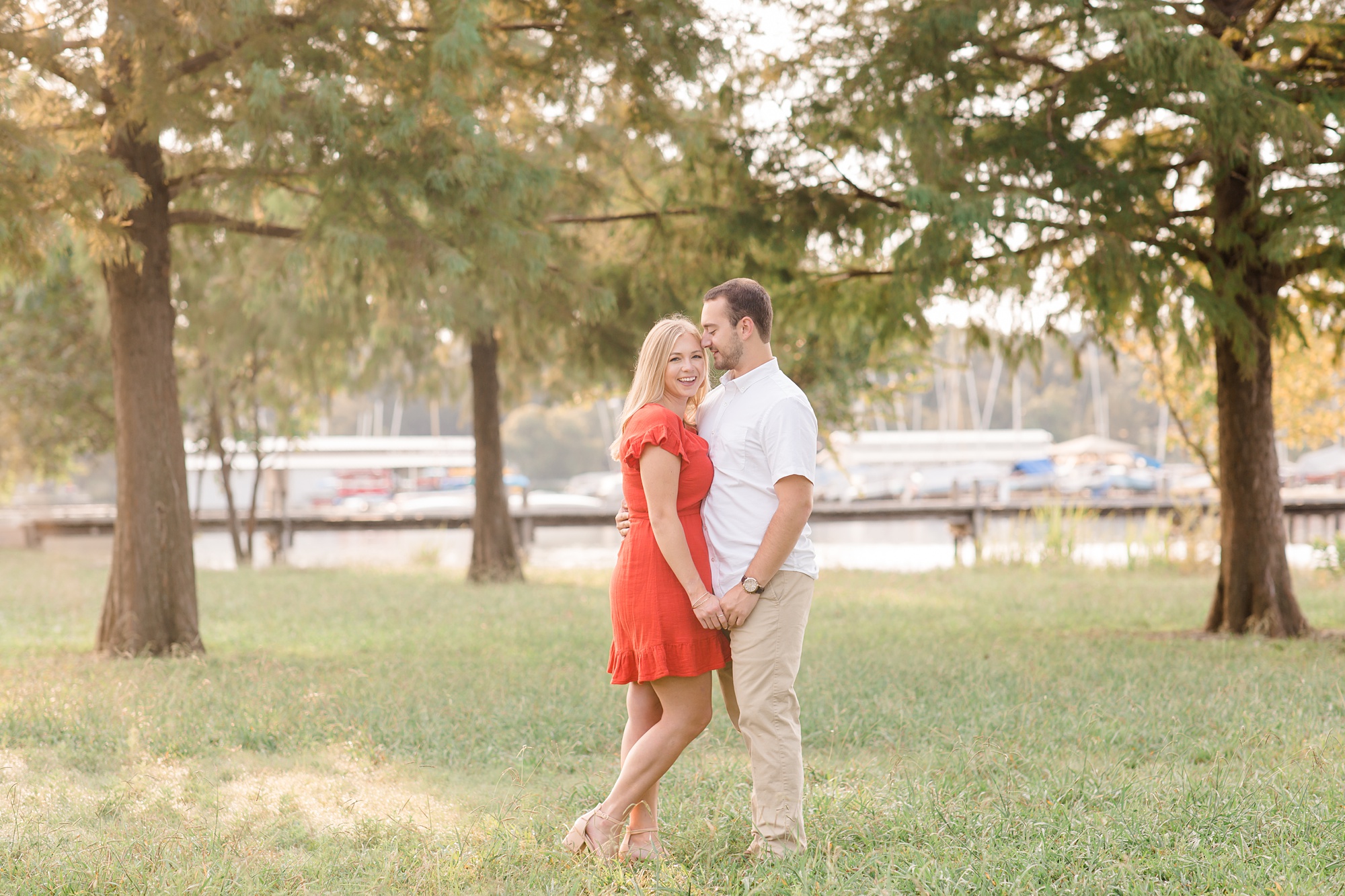 couple poses in trees outside Dallas Texas 