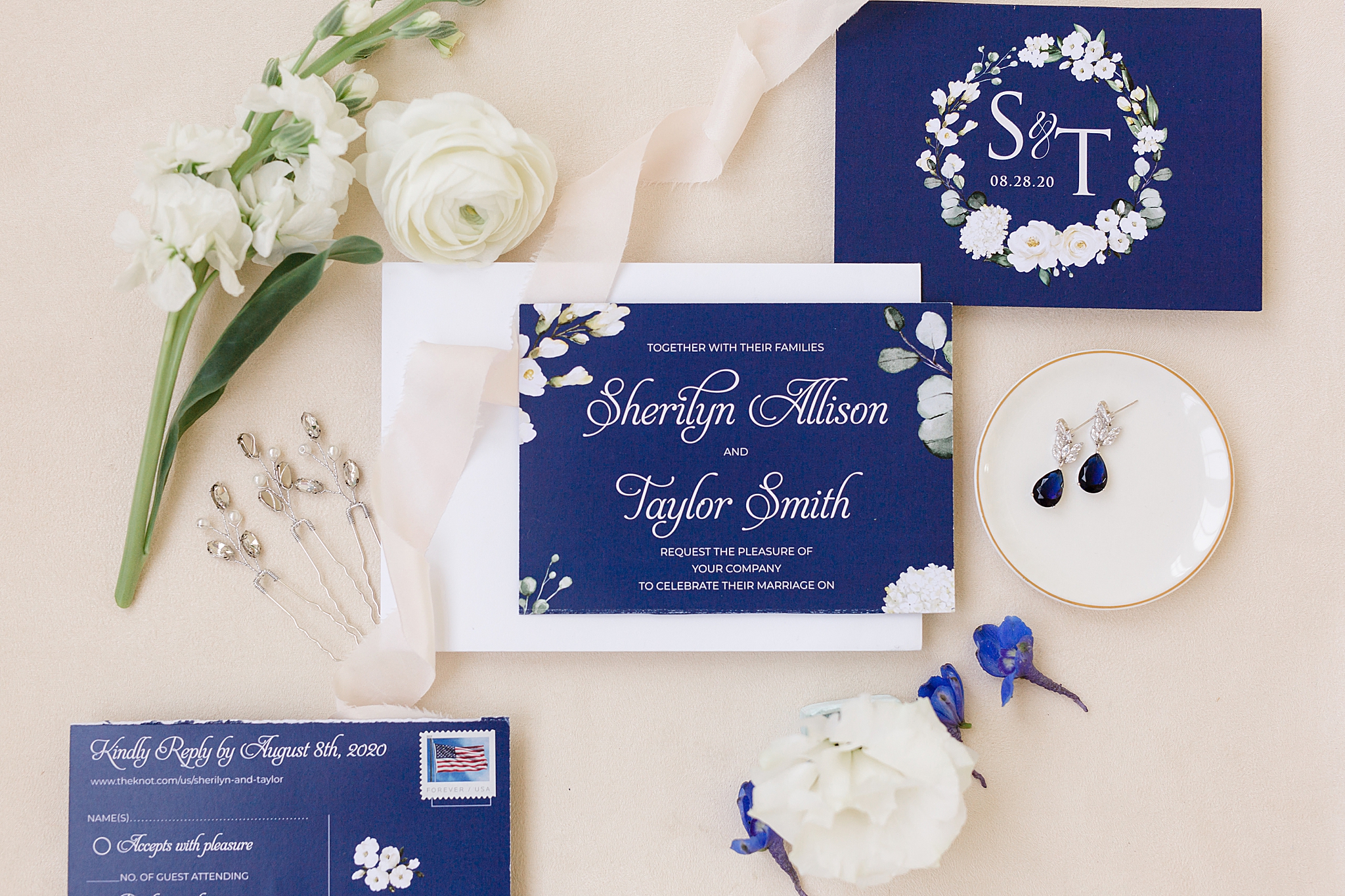 navy wedding invitation with white script font