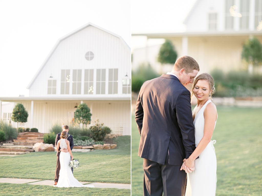 bride and groom stand holding hands in front of The Nest at Ruth Farms
