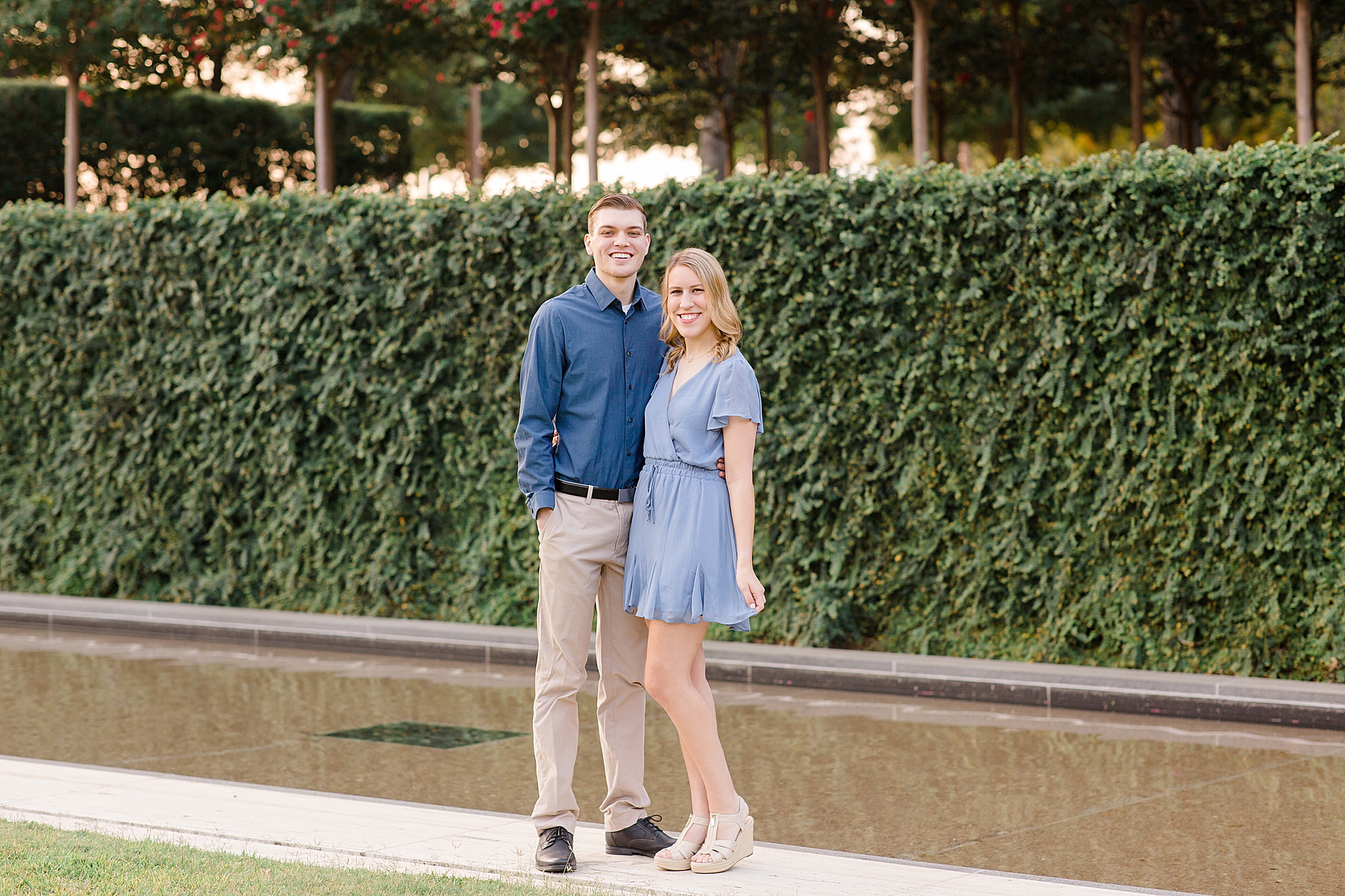 Fort Worth engagement photos near ivy wall