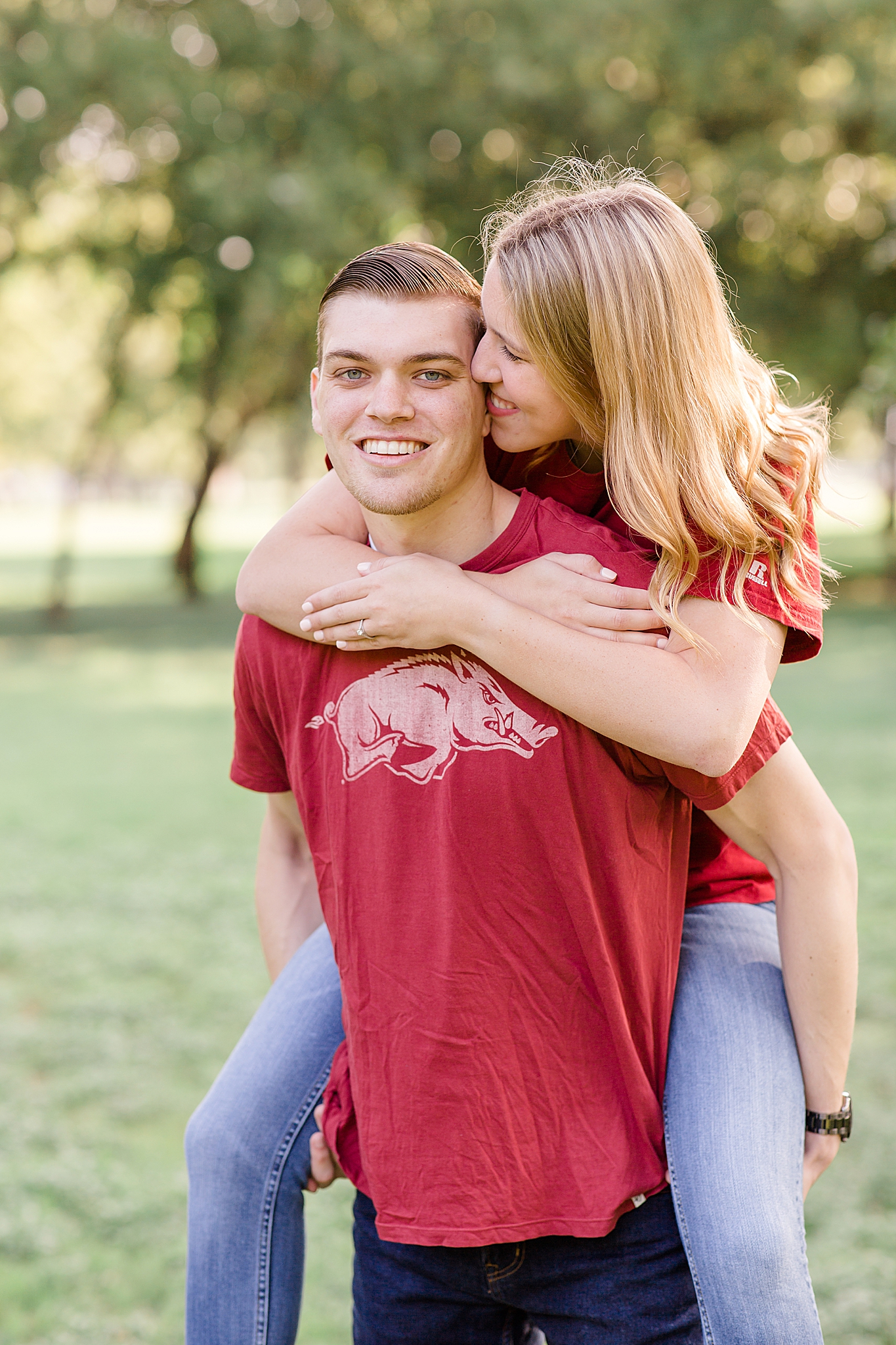 piggy back ride during casual engagement photos