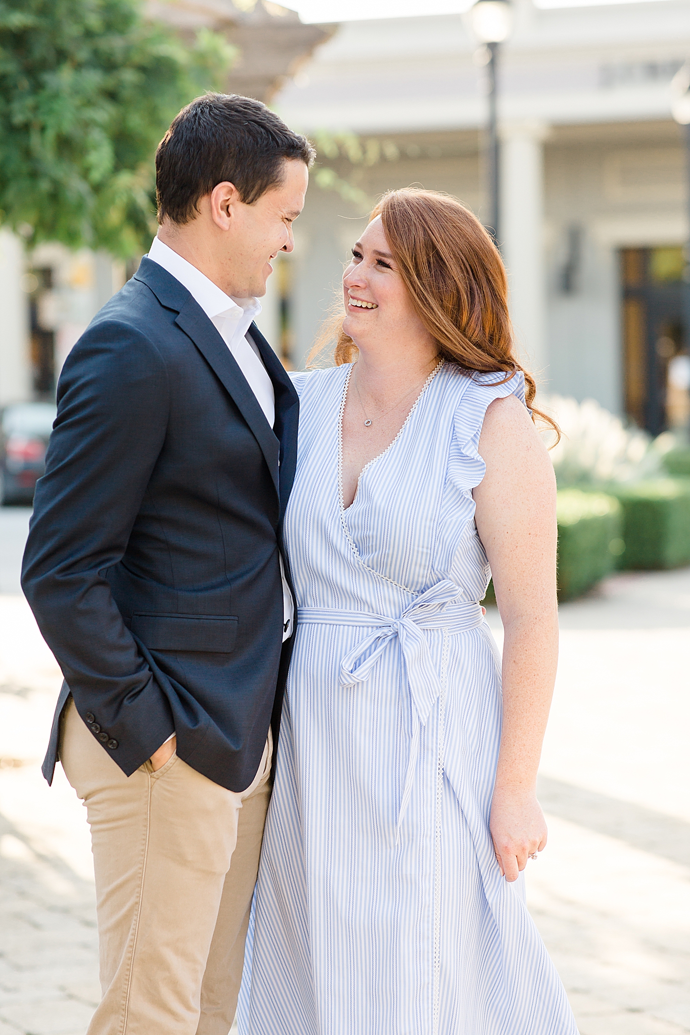 Southlake Town Square engagement session with couple in blue outfits