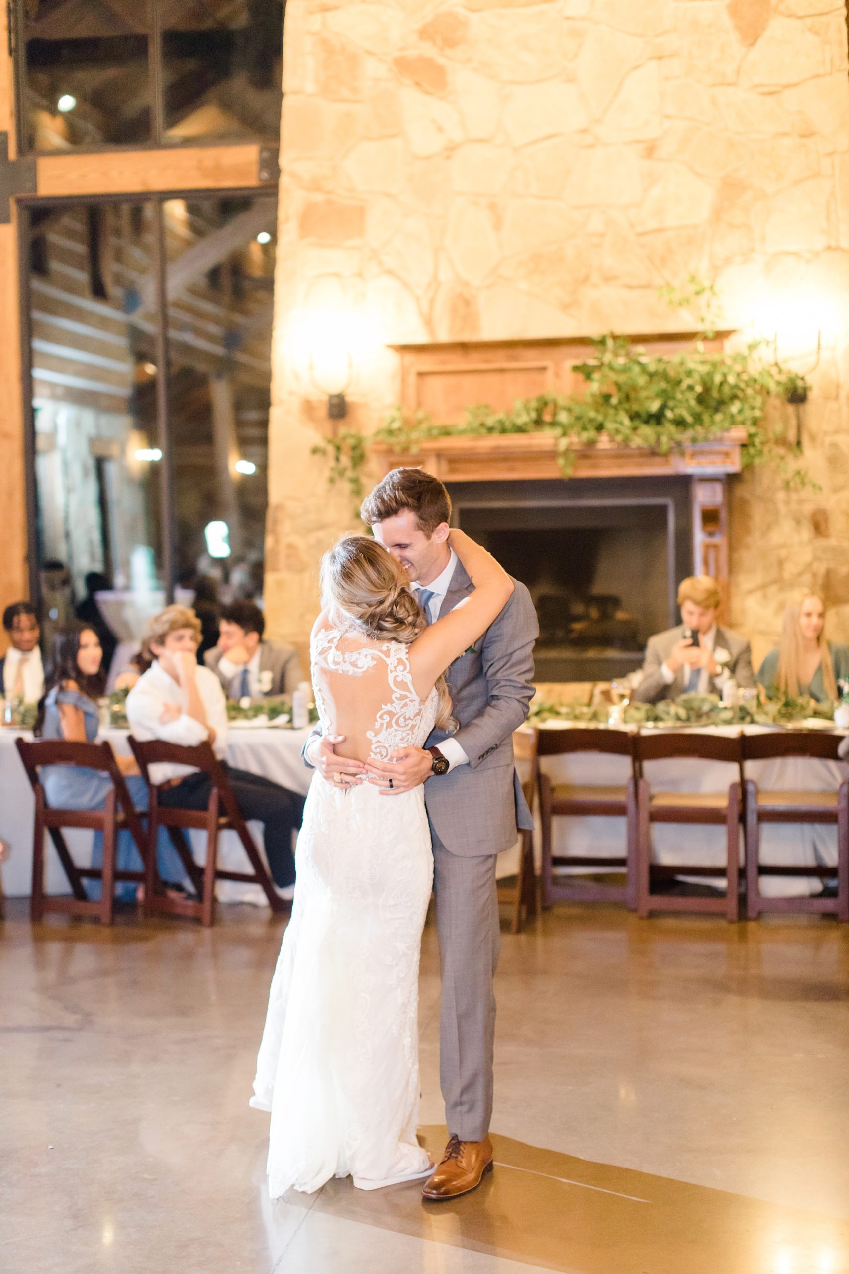 newlyweds dance together during The Lodge Wedding reception
