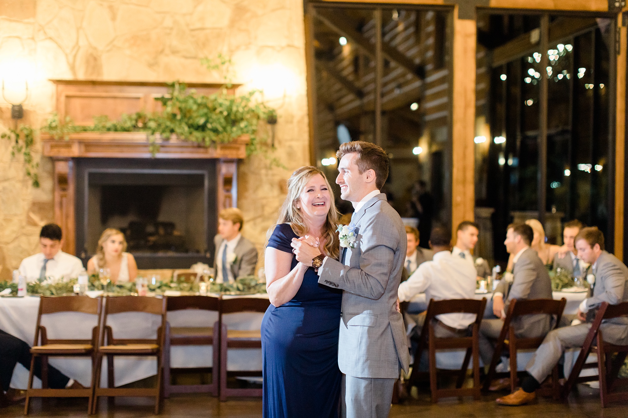 groom and mom dance during The Lodge Wedding reception