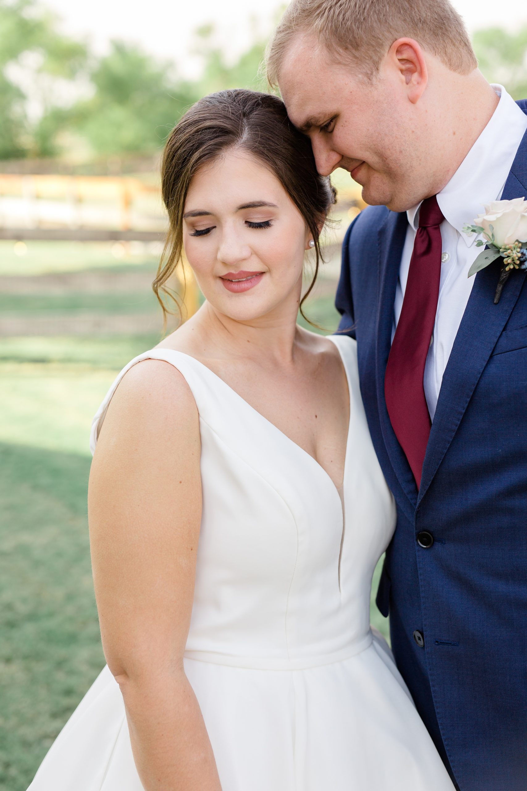 bride and groom pose during Texas wedding portraits