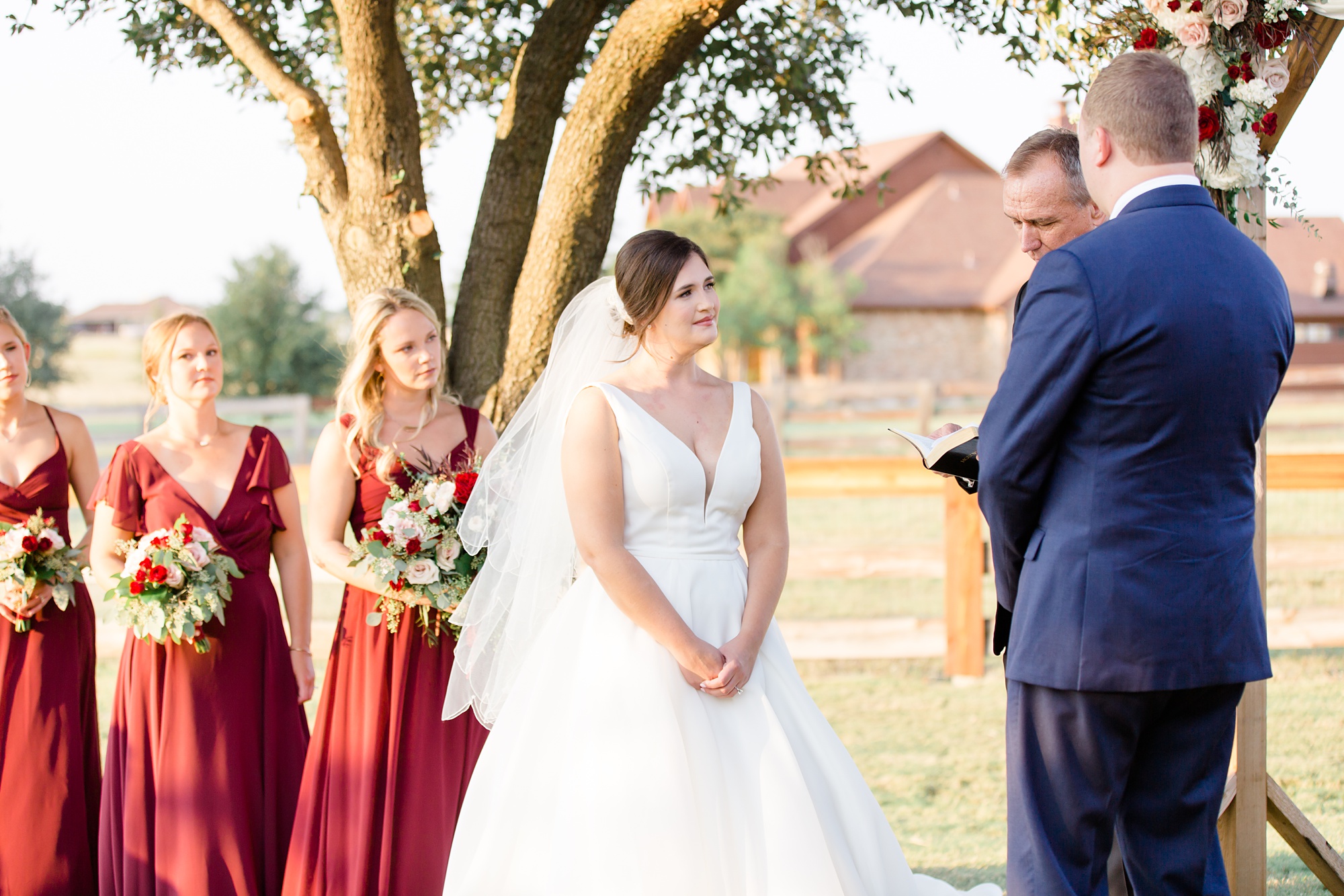 bride and groom exchange vows during Texas wedding