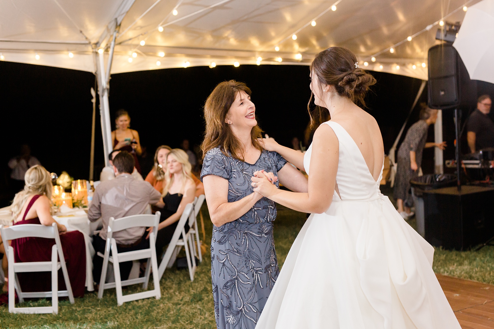 mom and bride dance during Argyle TX wedding reception