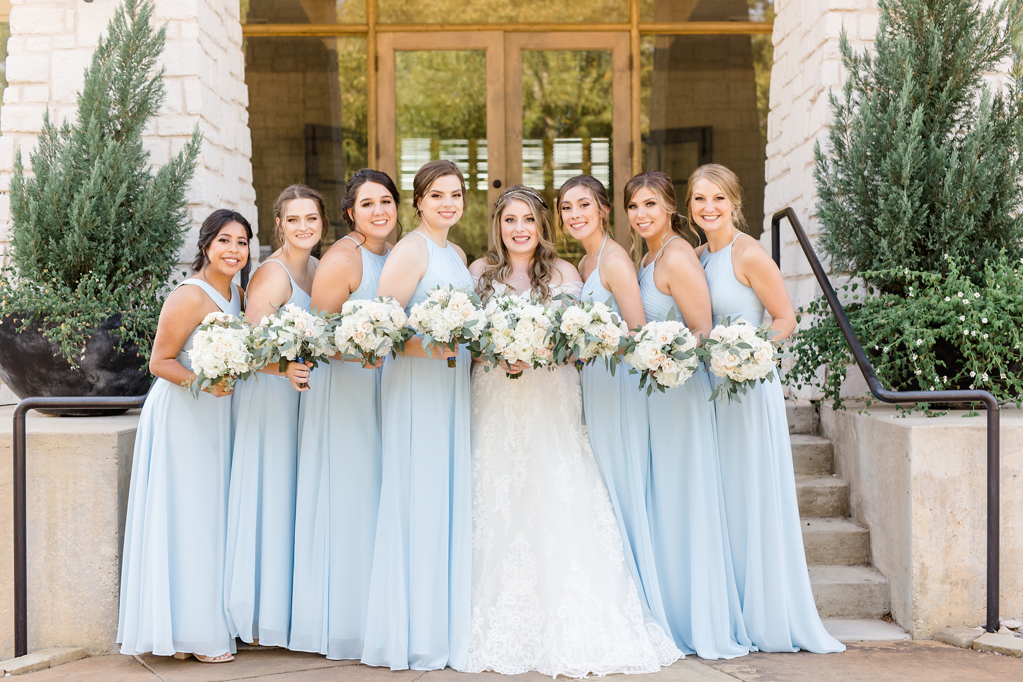 bridesmaids in sky blue dresses from Azazie