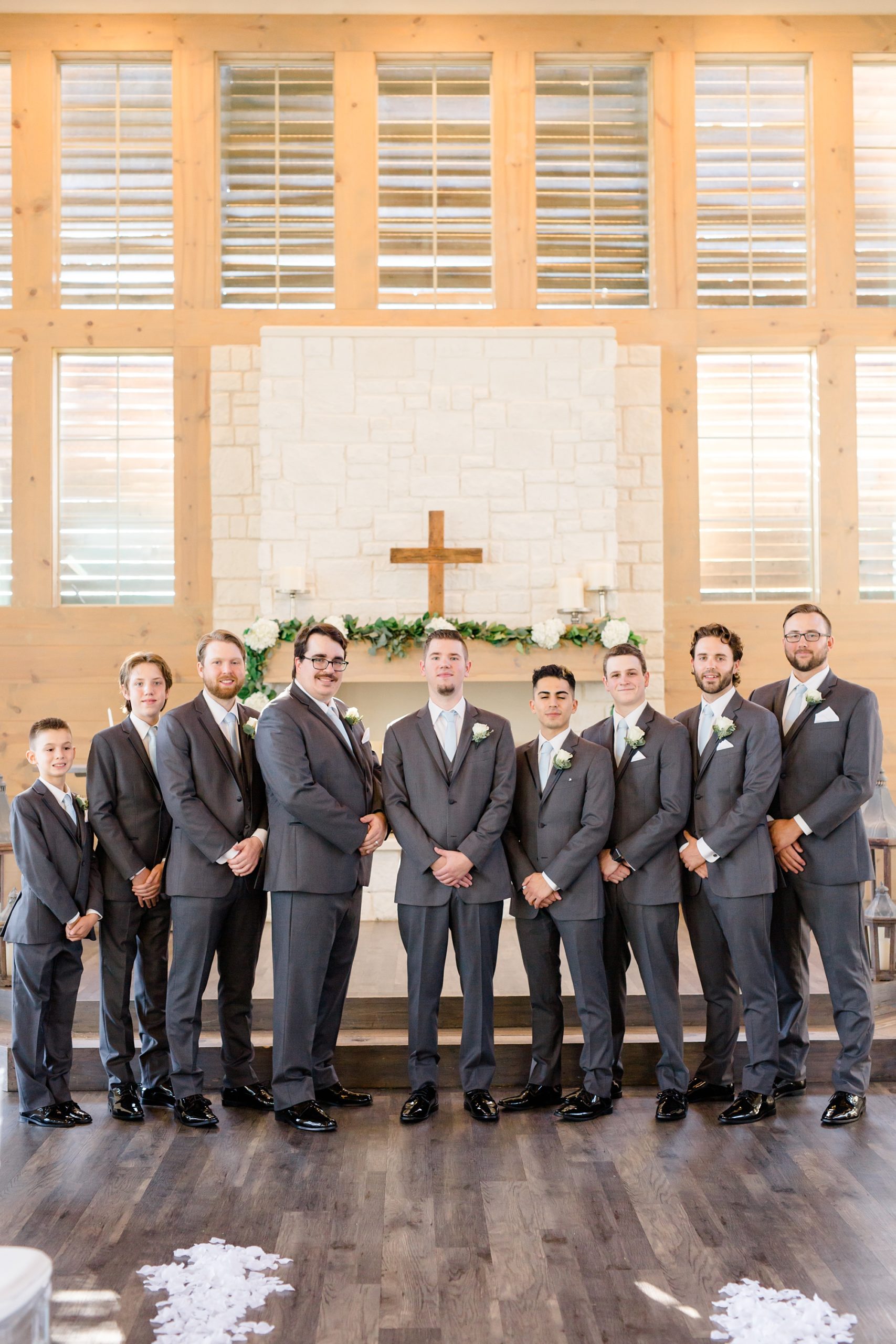 groomsmen pose before Texas wedding