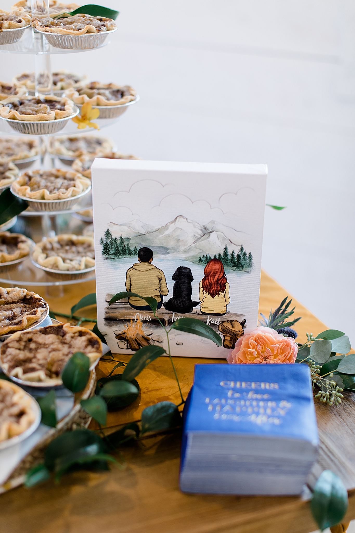 custom painting on dessert table of bride and groom