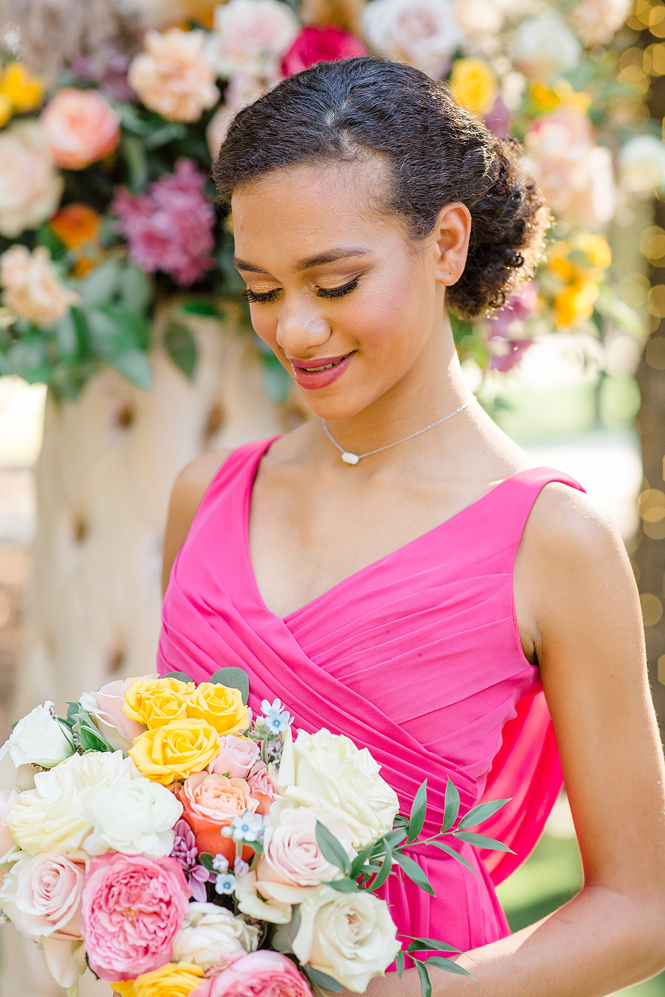 bridesmaid in pink dress poses for Junior Bridesmaids Styled Shoot