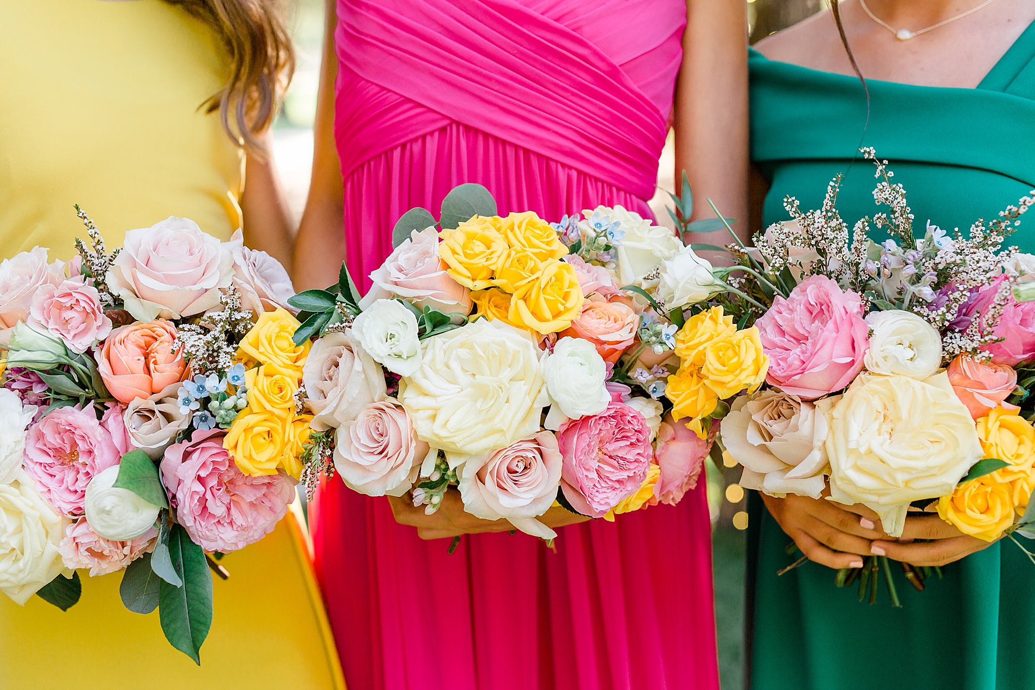 three jr. bridesmaids hold pastel bouquets during Junior Bridesmaids Styled Shoot