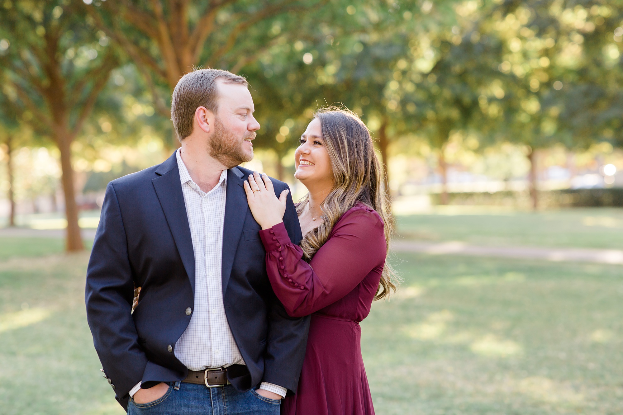 bride and groom laugh with each other during TX portraits