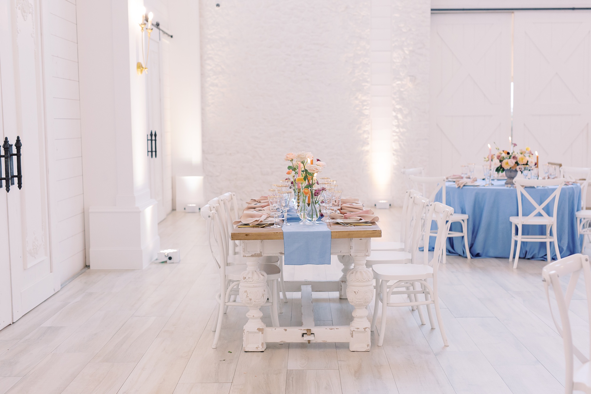family style reception table with blue table runner