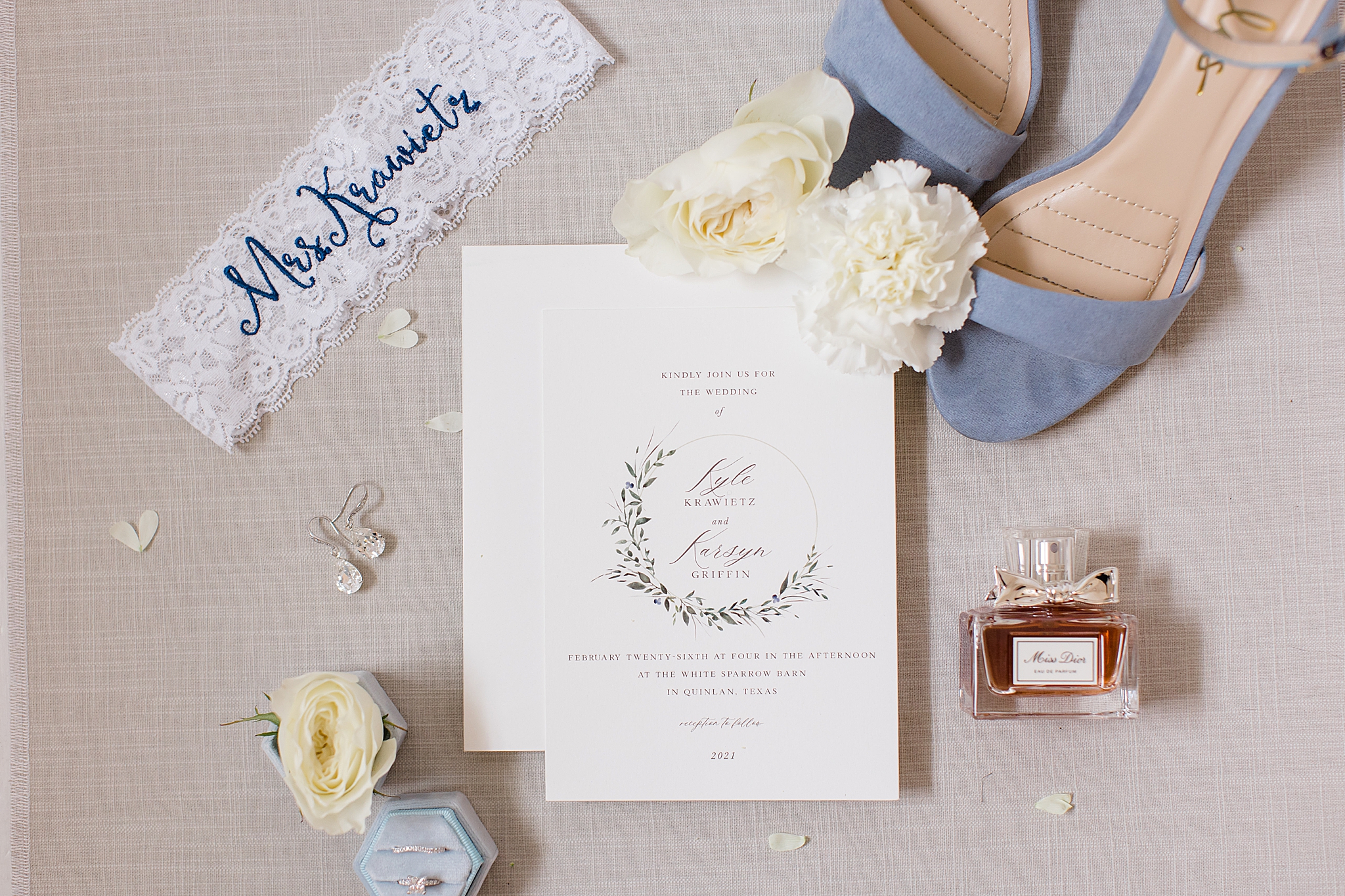 winter wedding invitation suite with blue shoes