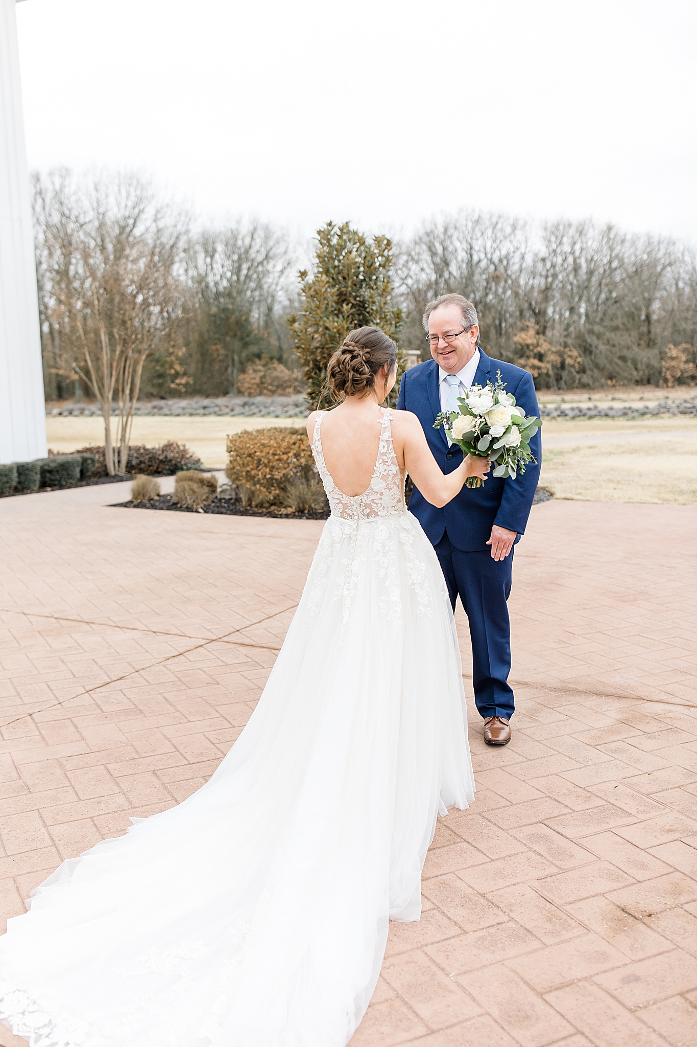bride and father have first look before The White Sparrow wedding