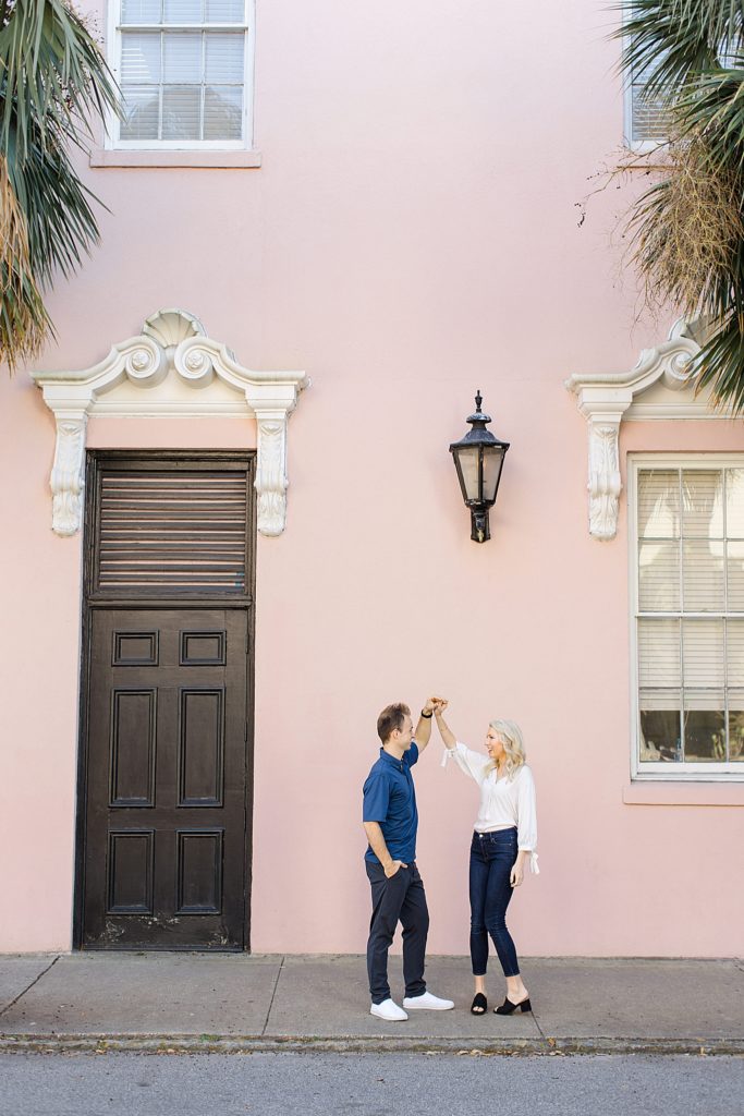married couple dances during Charleston anniversary portraits