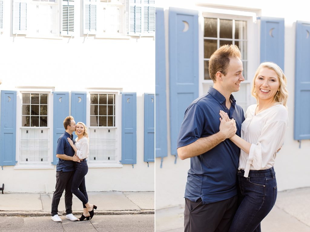 couple poses by house with blue shutters in Charleston