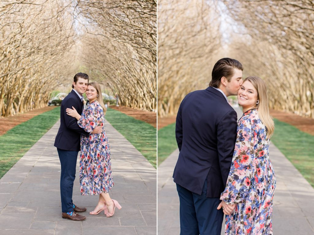 groom kisses bride's cheek during Dallas Arboretum engagement session