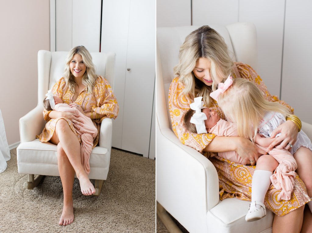 mom holds baby girl and big sister during Dallas lifestyle newborn portraits