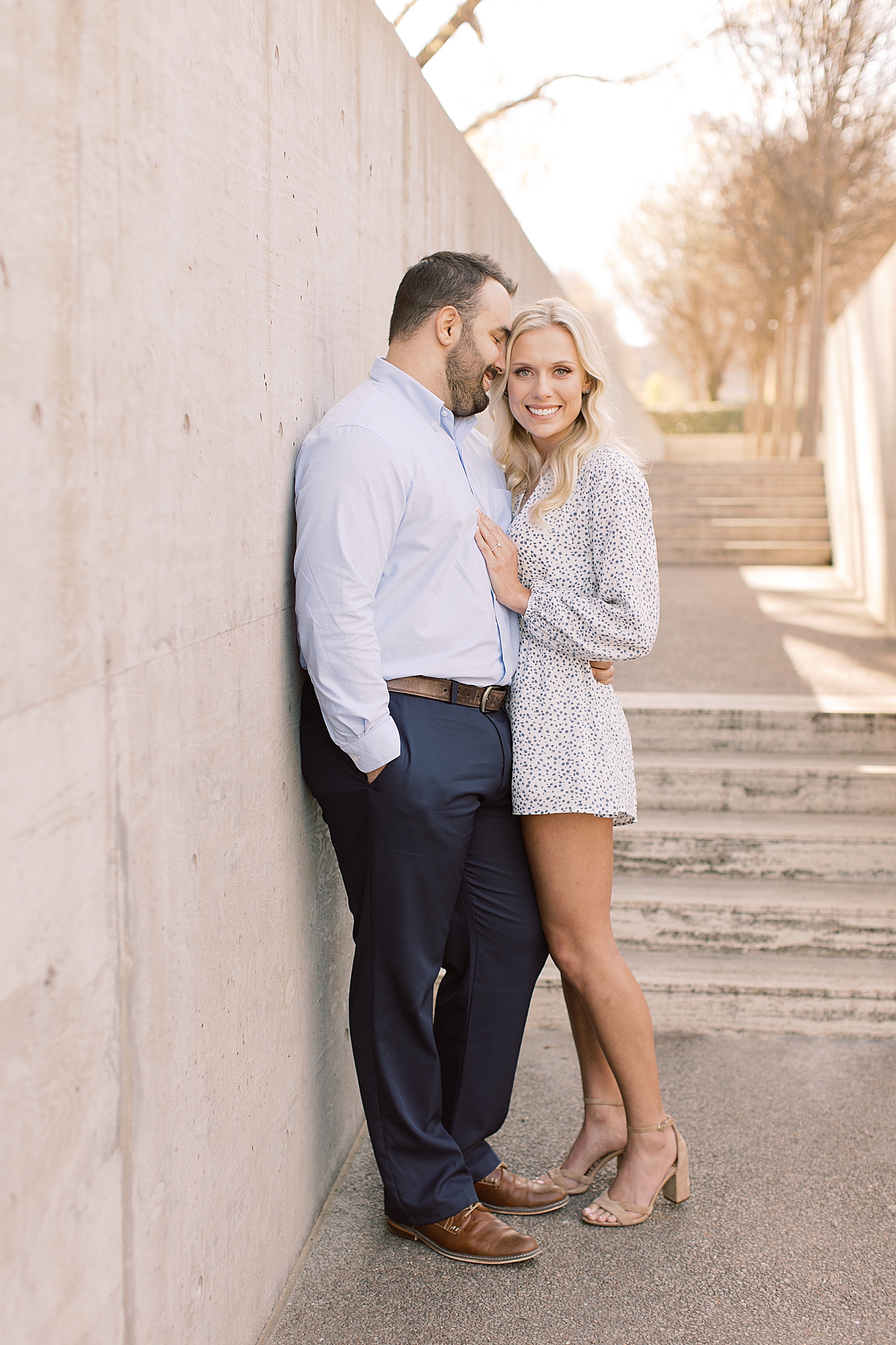 Kimball Art Museum engagement portraits of couple in light outfits