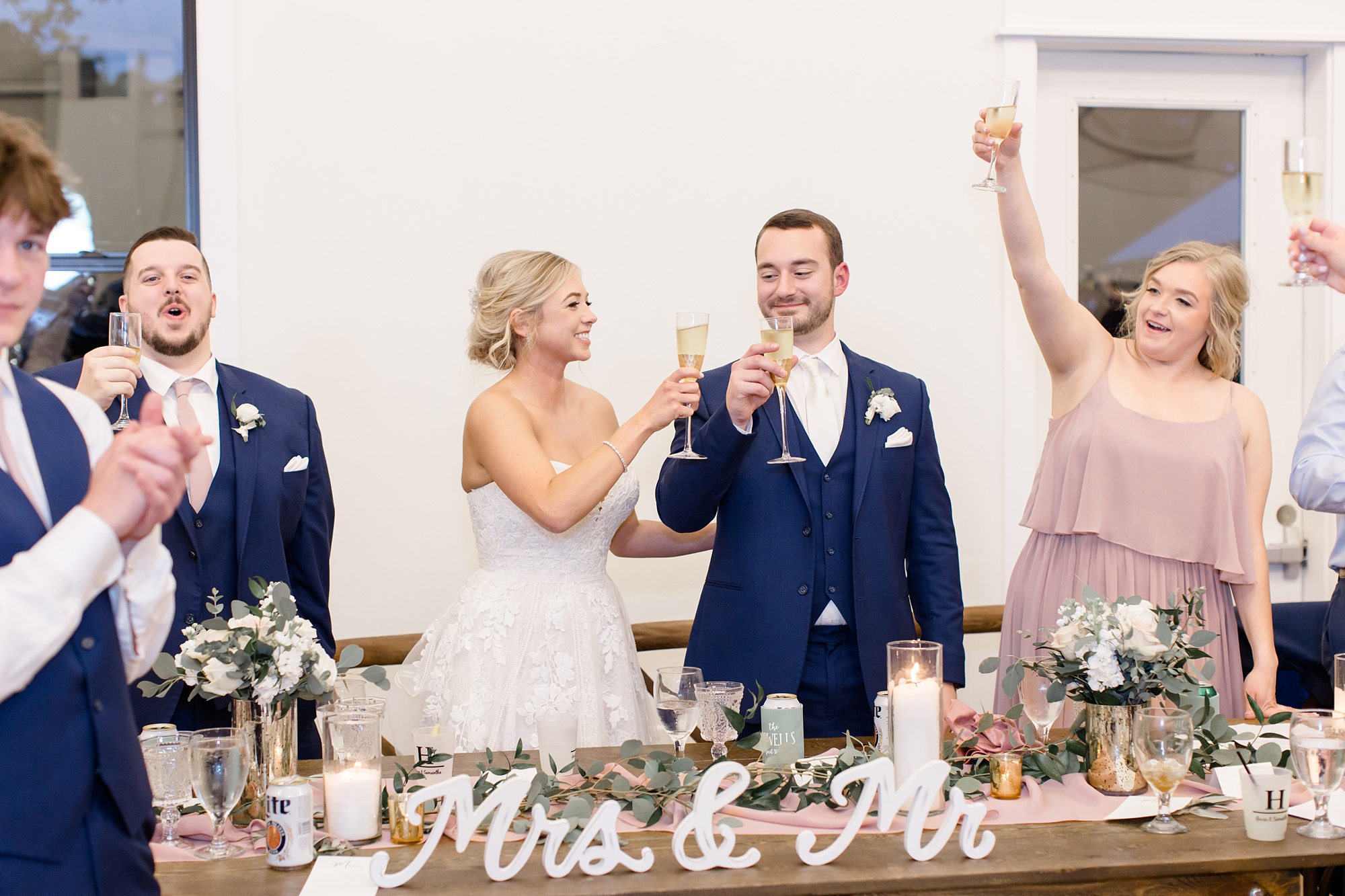 newlyweds toast during wedding toasts