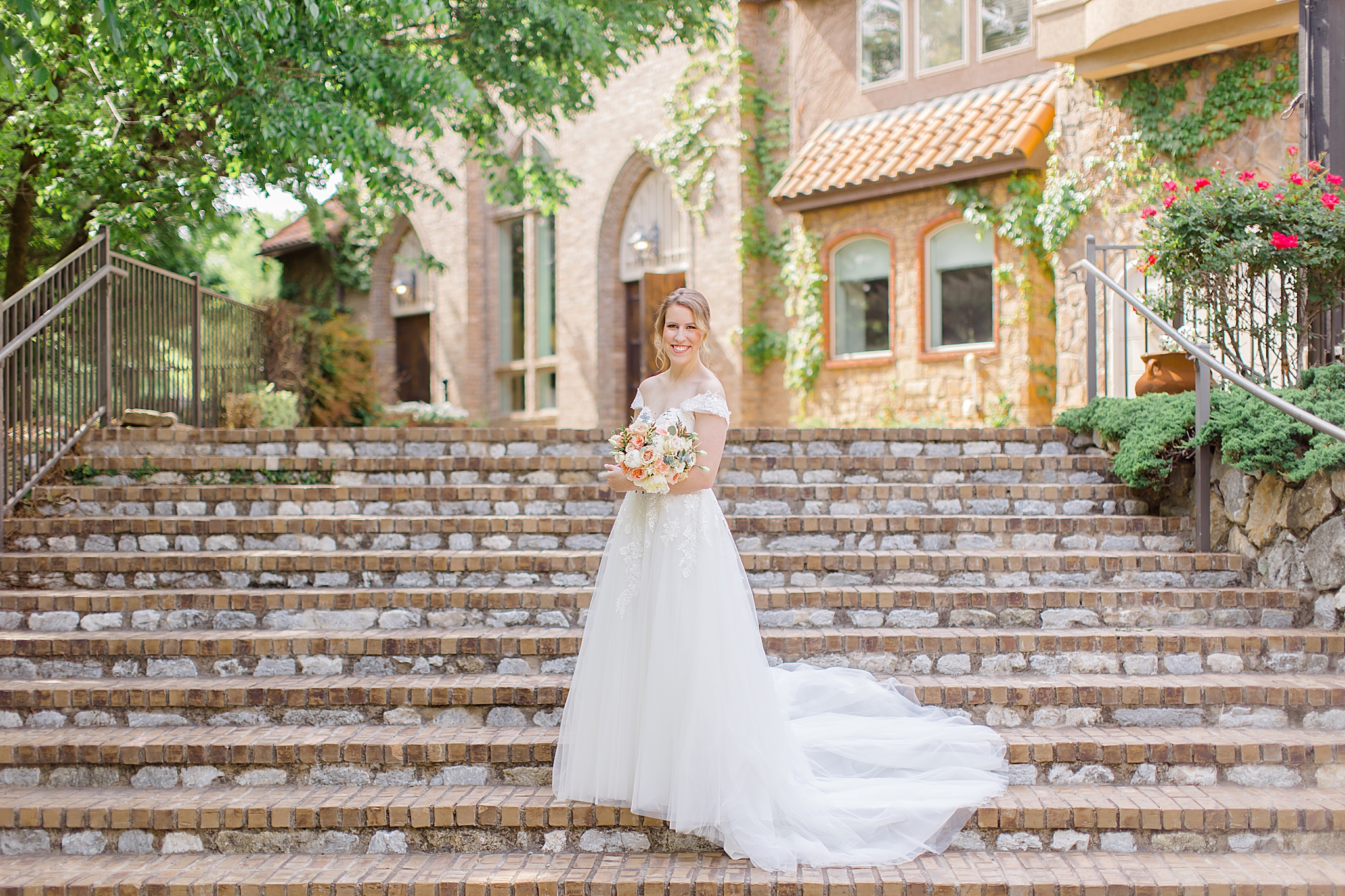 bride stands on steps during Texas bridal session