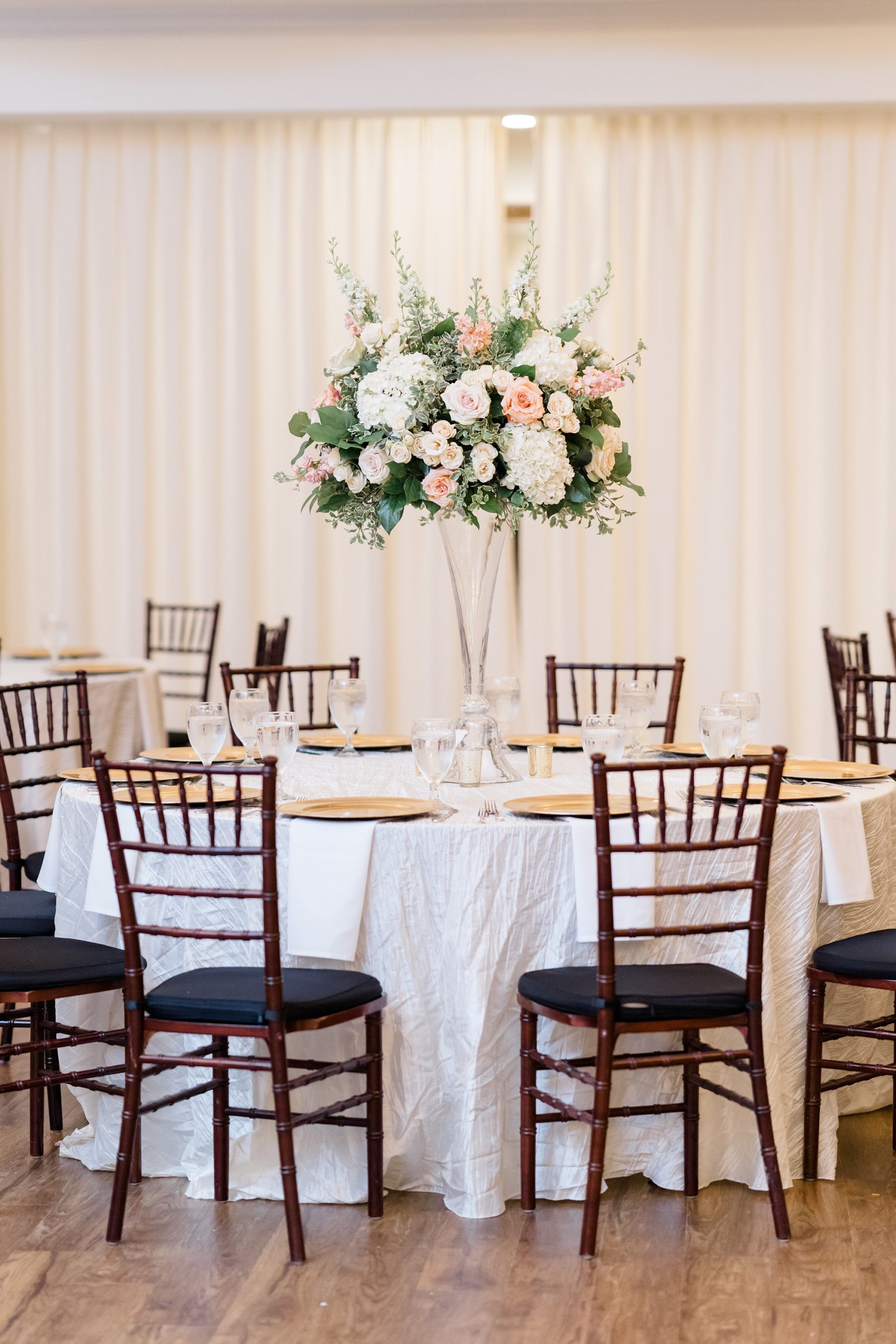 reception at Aristide Mansfield with floral centerpiece 