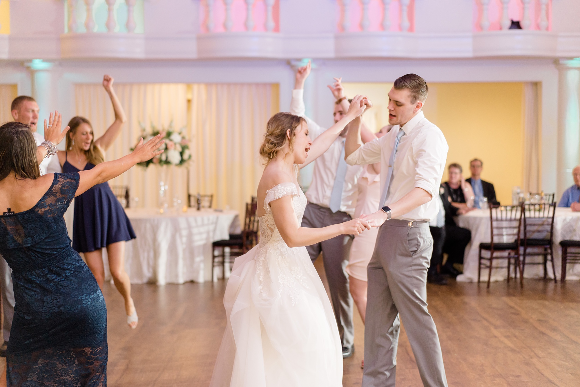 bride and groom dance during wedding reception at Aristide Mansfield