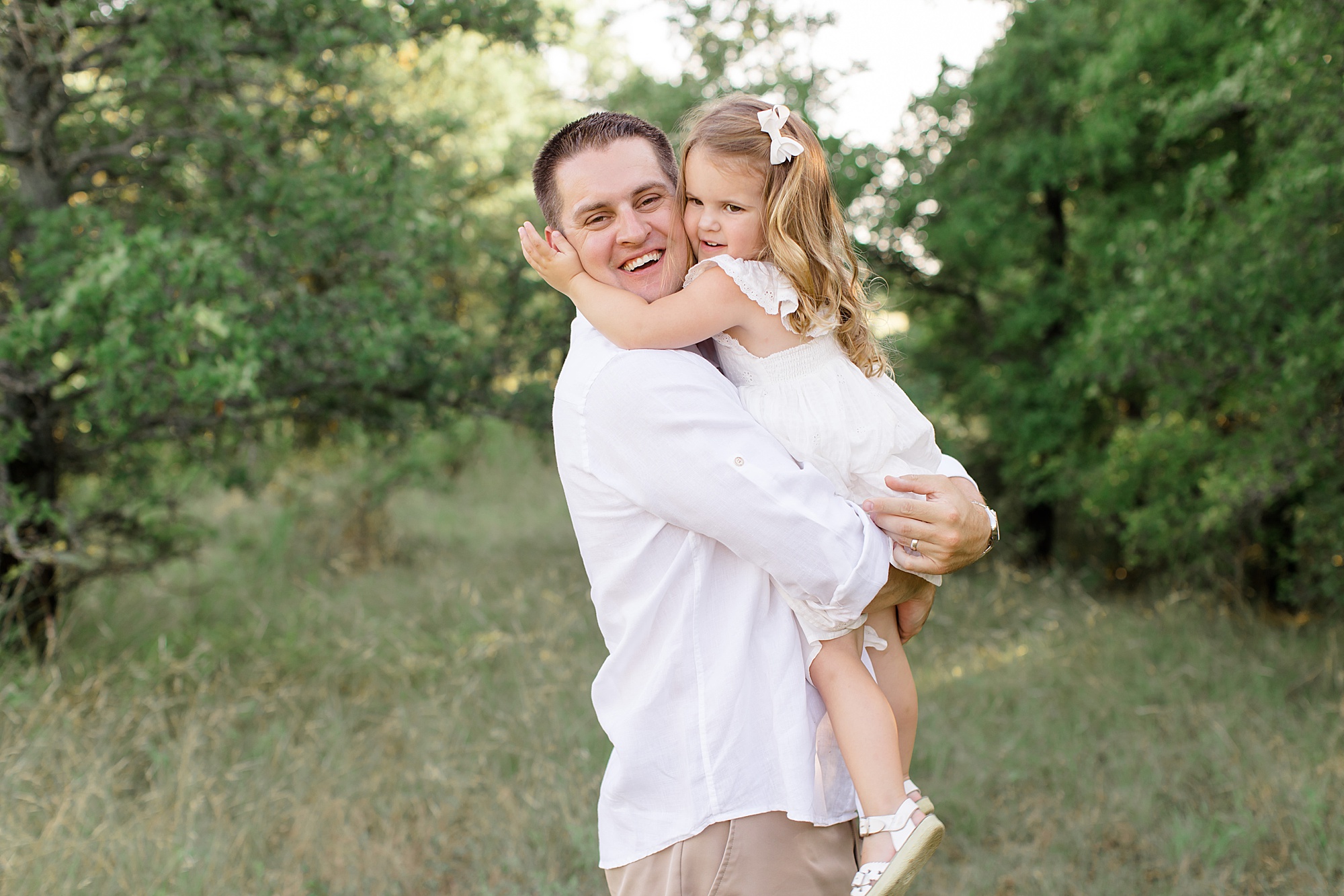 toddler hugs dad during Texas family photos