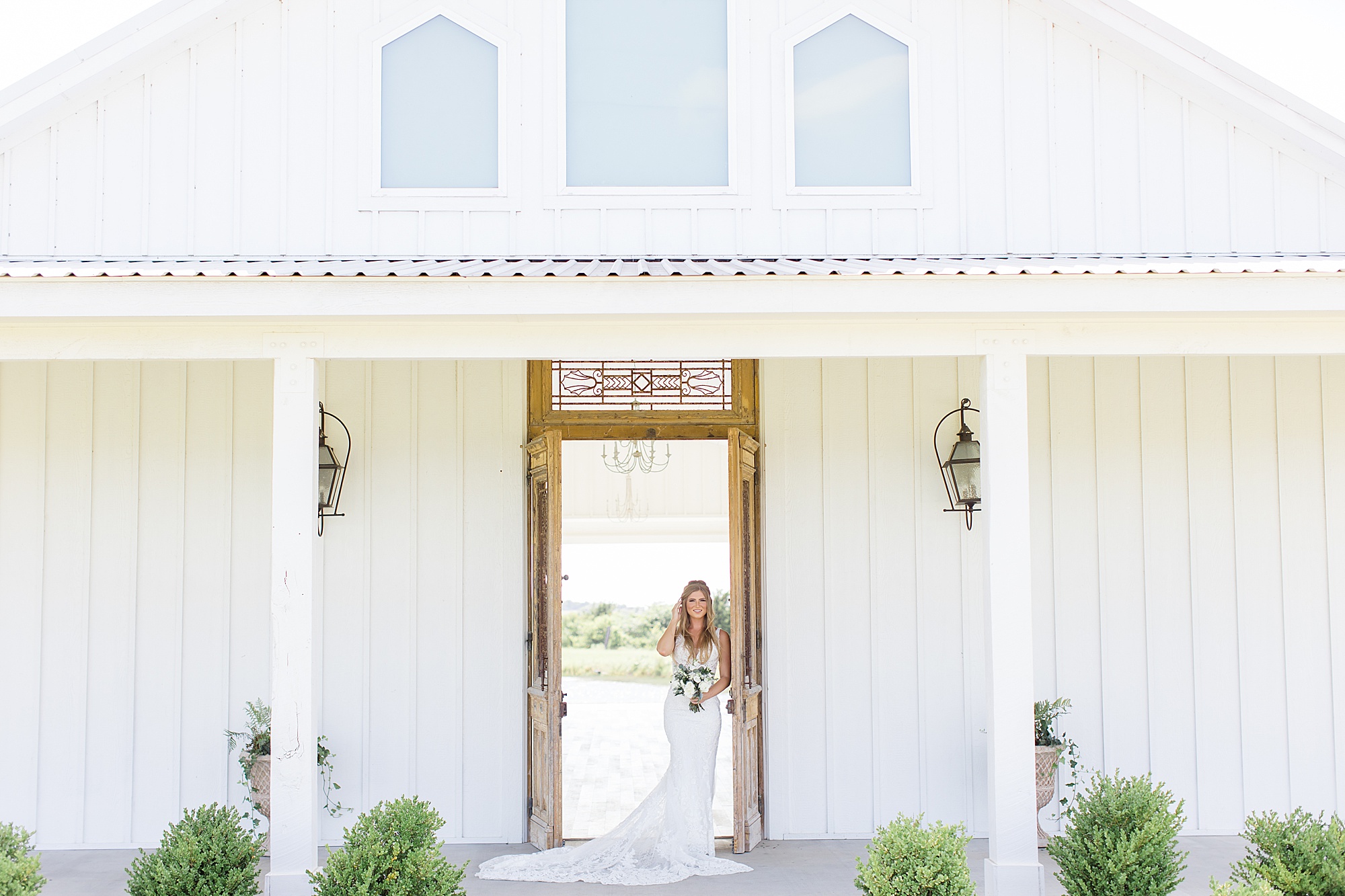 bride leans in doorframe at The Grand Ivory
