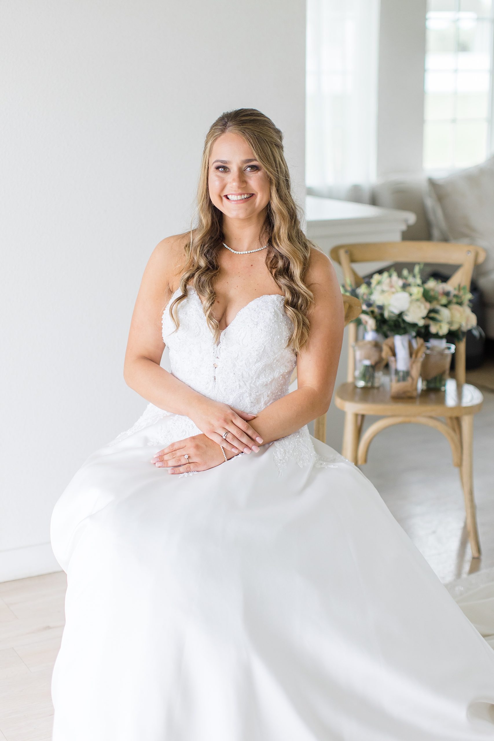 bride sits after preparing for wedding in Texas