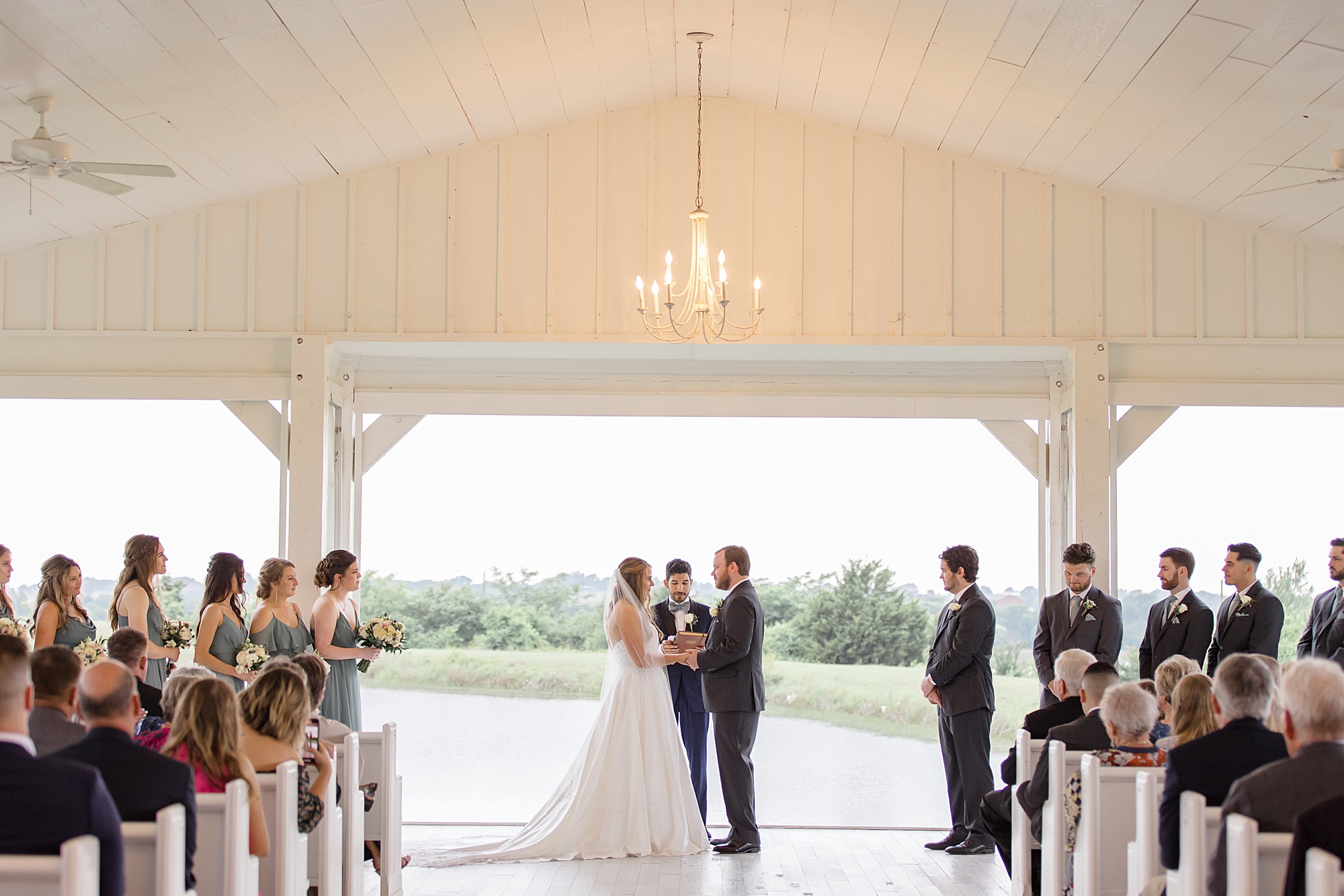 bride and groom exchange vows during TX wedding ceremony