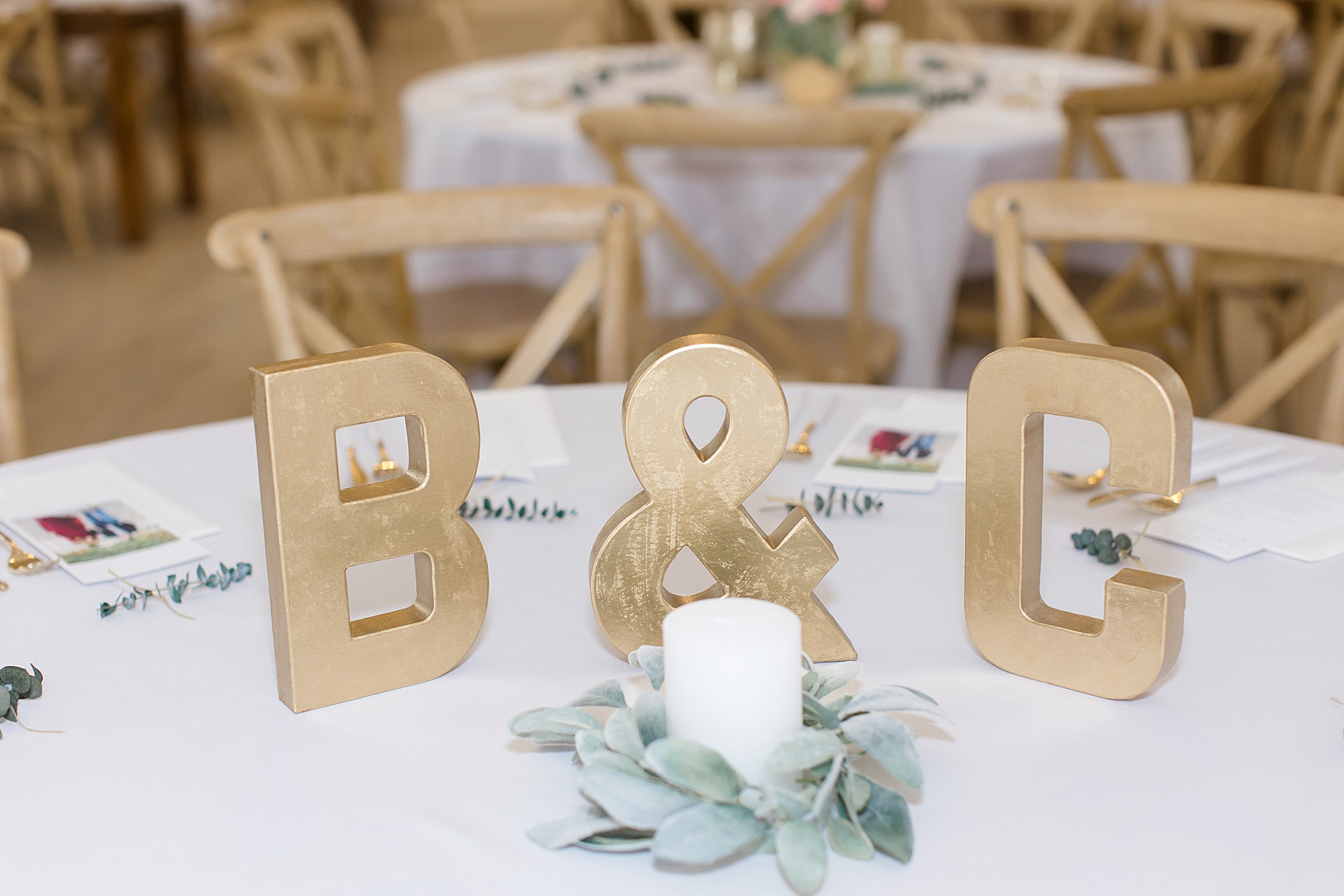 gold letters on reception table at Texas wedding reception